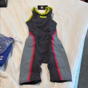 Arena open back kneeskin NWT